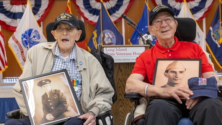 From left, David Wolman, 102, served as control tower operator in...