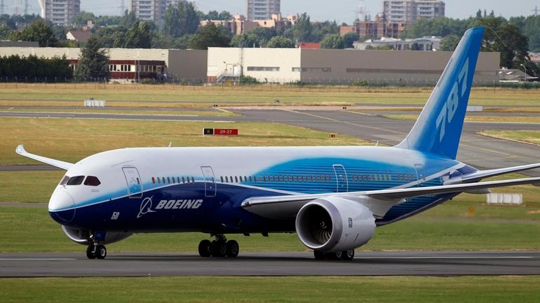 The Boeing 787 Dreamliner taxis after its landing at Le...