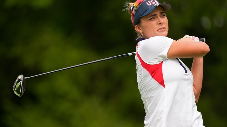 United States' Lexi Thompson hits from the third tee during...