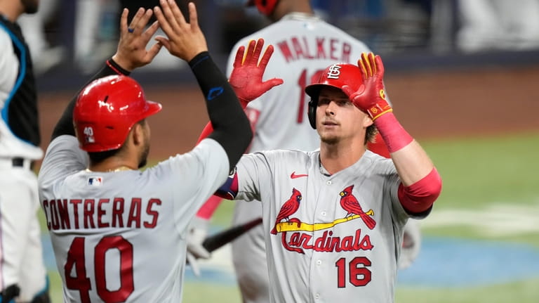 9th inning error gives Marlins 10-9 victory over Cards