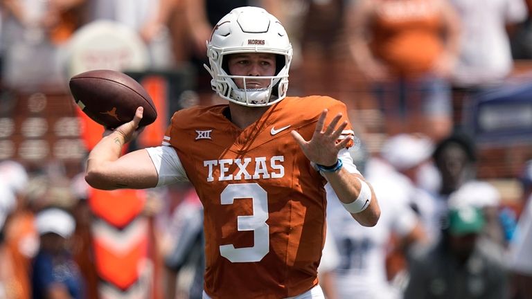 Texas quarterback Quinn Ewers (3) throws against Rice during the...