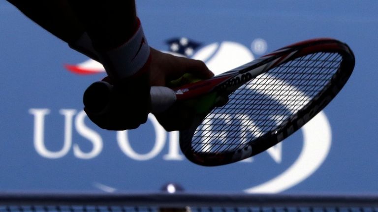 Anna Karolina Schmiedlova, of Slovakia, prepares to serve to Petra...