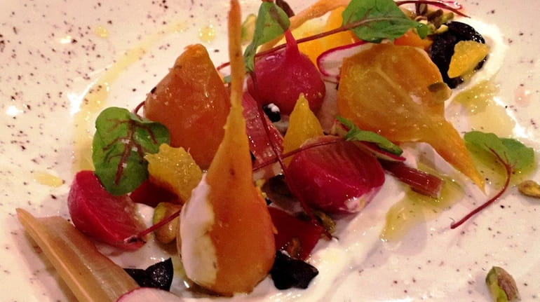 A salad of roasted beets with Greek yogurt, pickled Swiss...