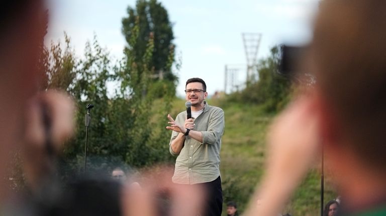 Russian opposition politician Ilya Yashin speaks during an event with...