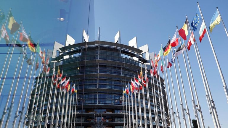 European countries ' flag fly at the European Parliament, Tuesday,...