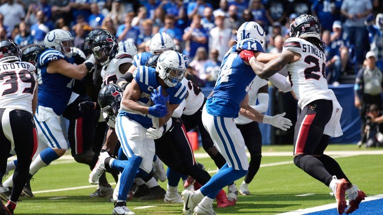 Indianapolis Colts running back Jonathan Taylor (28) runs to the...