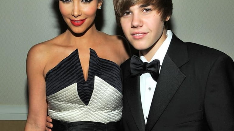 Kim Kardashian and Justin Bieber attend the TIME/CNN/People/Fortune 2010 White...