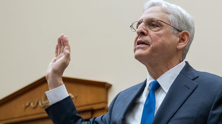 Attorney General Merrick Garland is sworn-in during a House Judiciary...