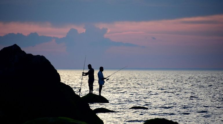 Fishing for bluefish at Wildwood State Park in Wading River on...