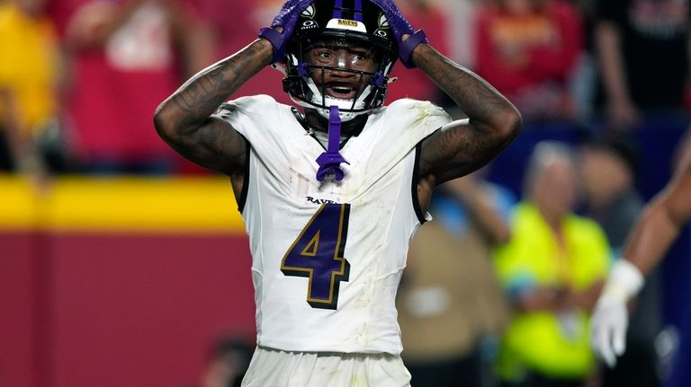 Baltimore Ravens wide receiver Zay Flowers reacts after missing a...