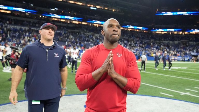 Houston Texans head coach DeMeco Ryans walks off the field...