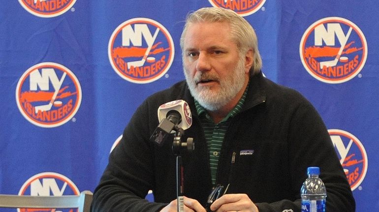 Garth Snow, Islanders general manager, answers questions from the media...