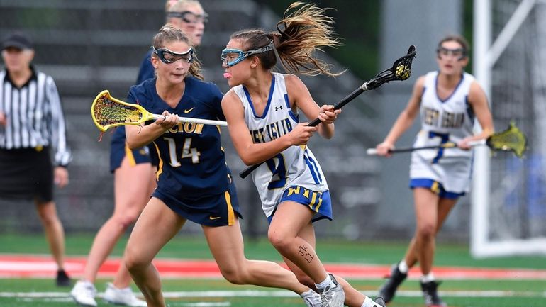 West Islip's Francesca Tofano, right, is defended by Victor's Ryann...