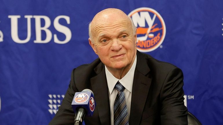 Islanders' Lou Lamoriello speaks with the media before a game...