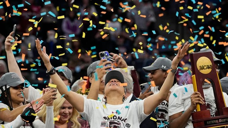 FILE - South Carolina head coach Dawn Staley celebrates after...