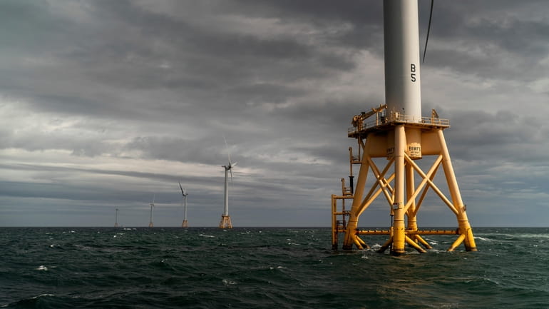 FILE- The five turbines of America's first offshore wind farm,...