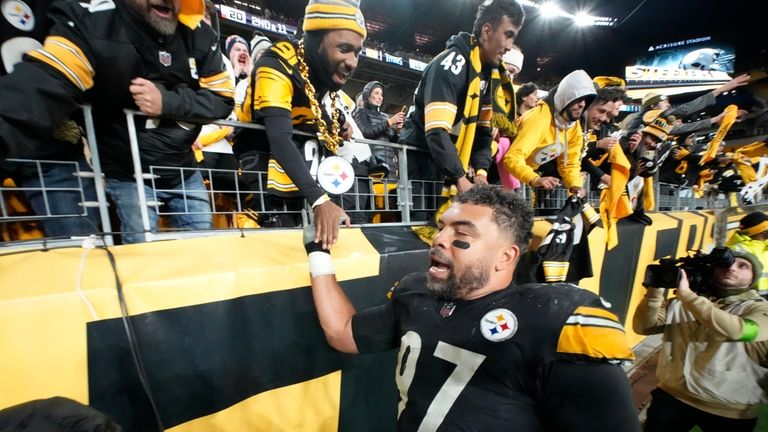 Pittsburgh Steelers defensive tackle Cameron Heyward celebrates the team's win...