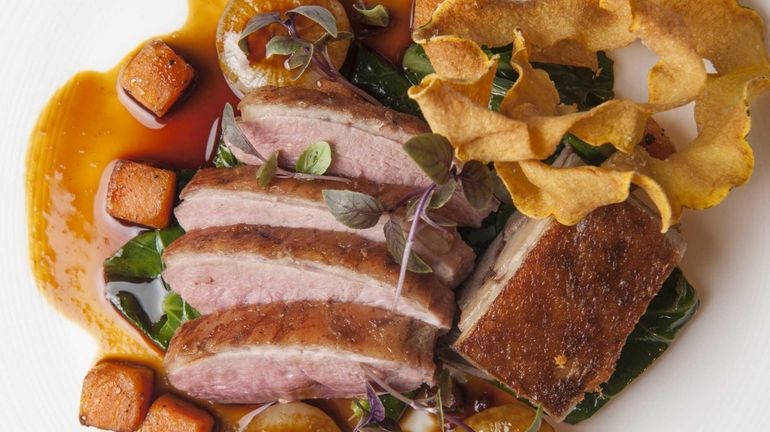 Topping Rose House's roasted, juicy Rohan duck benefits from syrah...