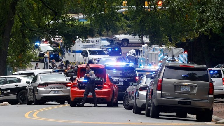 Law enforcement and first responders gather on South Street near...