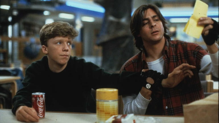 Anthony Michael Hall, left, and Judd Nelson star in the...