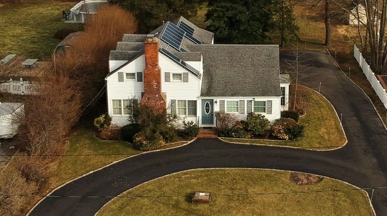 This Amityville home is listed for $575,000.