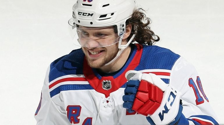 Artemi Panarin #10 of the Rangers celebrates his goal against...