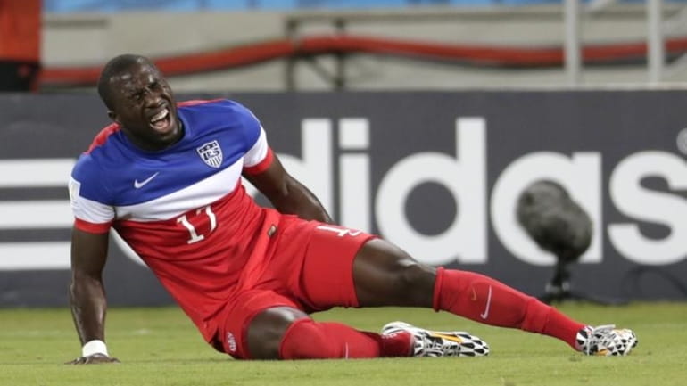 United States' Jozy Altidore grimaces after pulling up injured during...