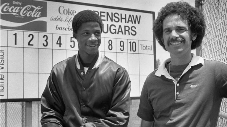 Darryl Strawberry, left, is shown with his coach Brooks Hurst...