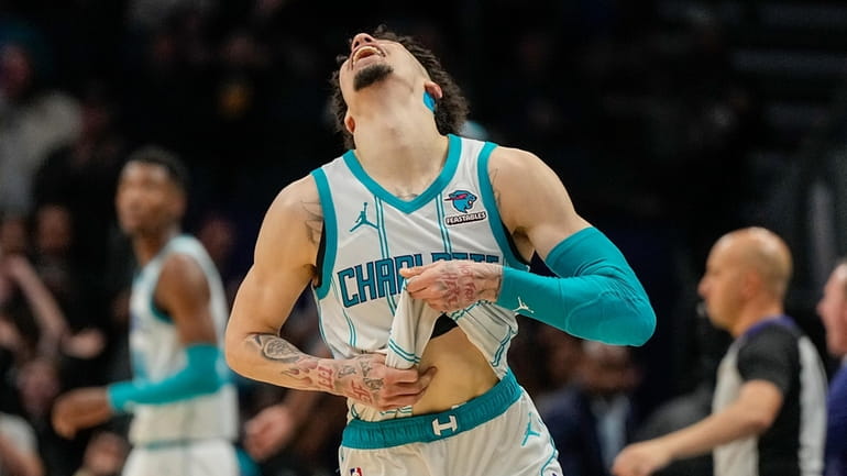 Charlotte Hornets guard LaMelo Ball celebrates their teams win against...