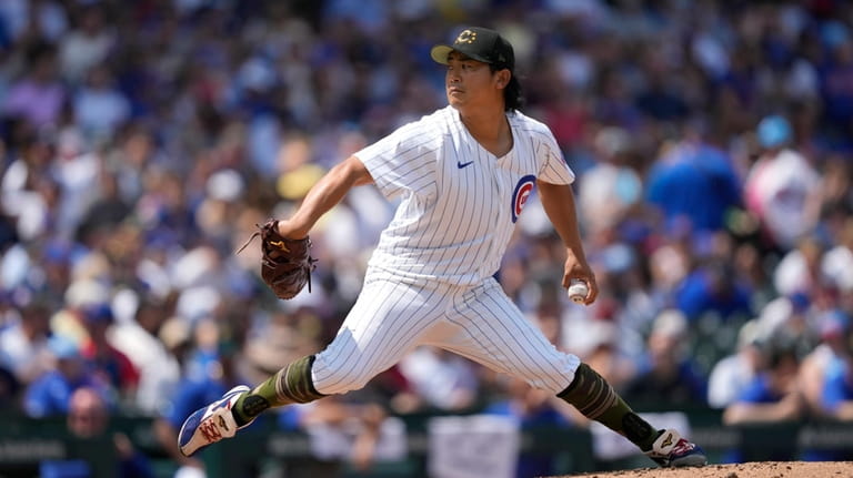 Chicago Cubs pitcher Shota Imanaga delivers during the fourth inning...