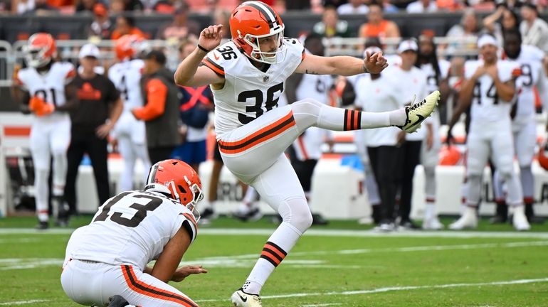 Cleveland Browns place kicker Cade York (36) kicks an extra...