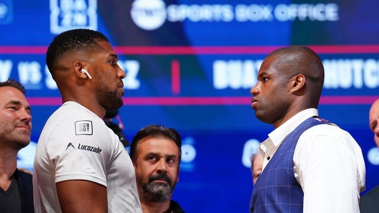 Britain's Anthony Joshua, left, and Daniel Dubois during a press...