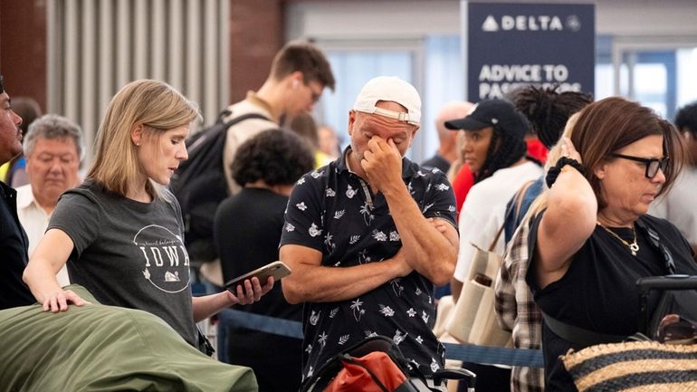 Tiffany McAllister and Andres Bernal try to rebook their flight...