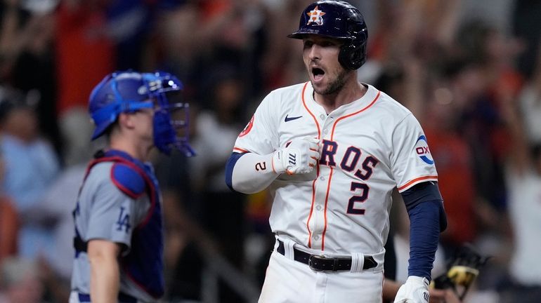 Houston Astros' Alex Bregman celebrates after hitting a walk-off home...