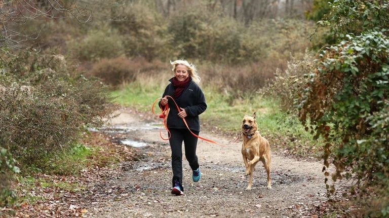 Lynda O'Malley, with her dog Lexi, loves the beaches and...