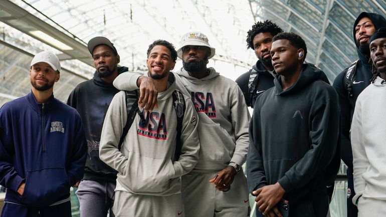 The United States Men's National Basketball Team pose for photographs...