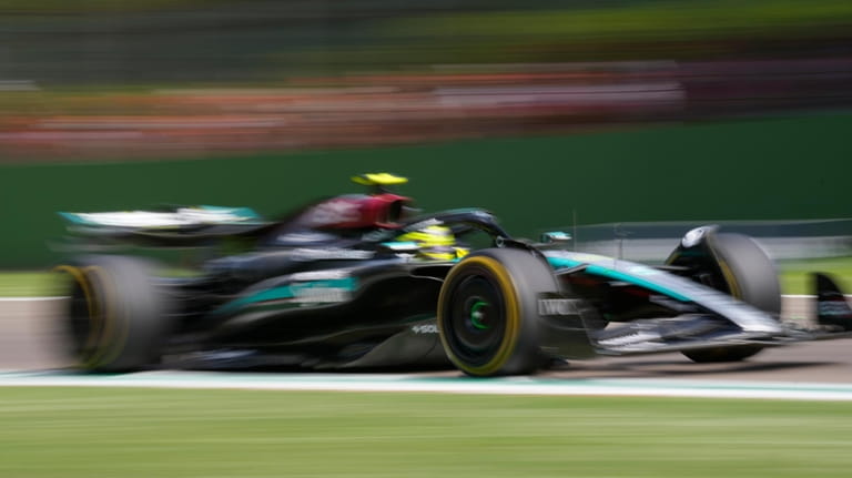 Mercedes driver Lewis Hamilton of Britain steers his car during...