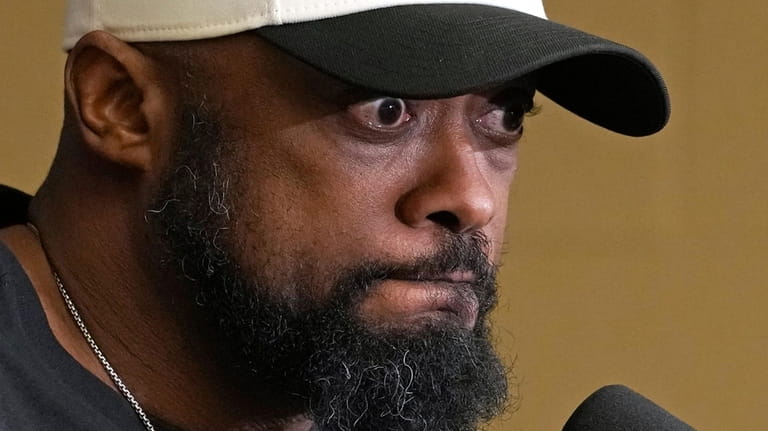 Pittsburgh Steelers coach Mike Tomlin meets with reporters following the...
