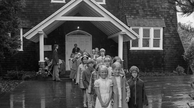 Members of a children's choir leave The Church at Point O'Woods...