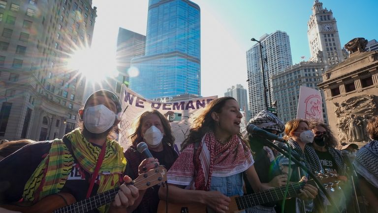 Protesters demonstrate prior to the Democratic National Convention Sunday, Aug....