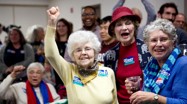 Julia Lewis, from left, Margaret Ray and Mary Banks celebrate...