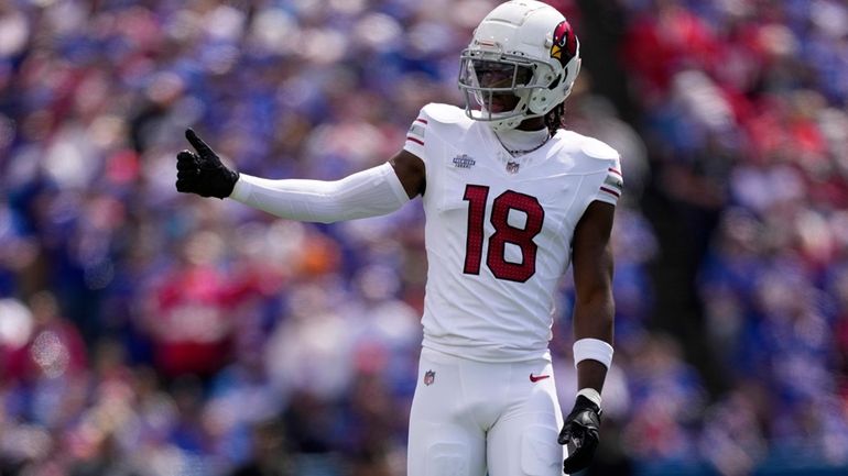 Arizona Cardinals' Marvin Harrison Jr. reacts during an NFL football...