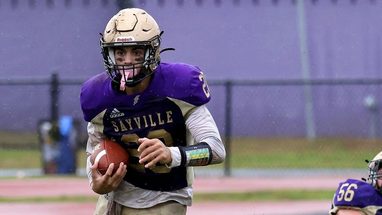 Sayville RB Kyle Messina heads upfield on a 68 yard...