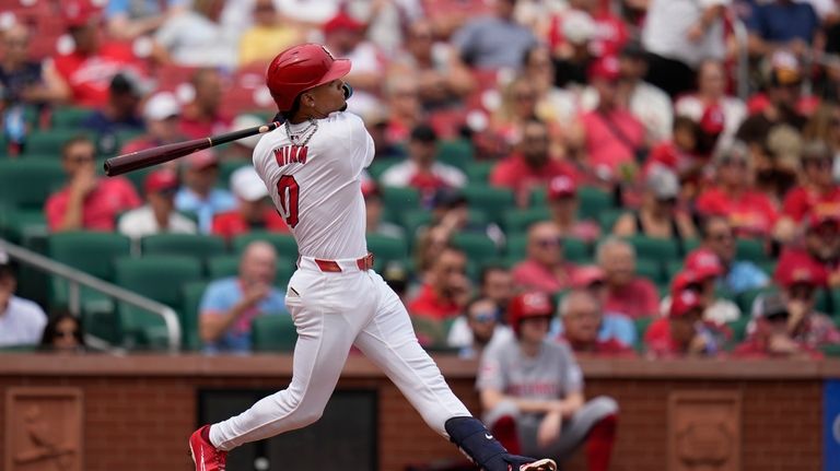 St. Louis Cardinals' Masyn Winn watches his solo home run...