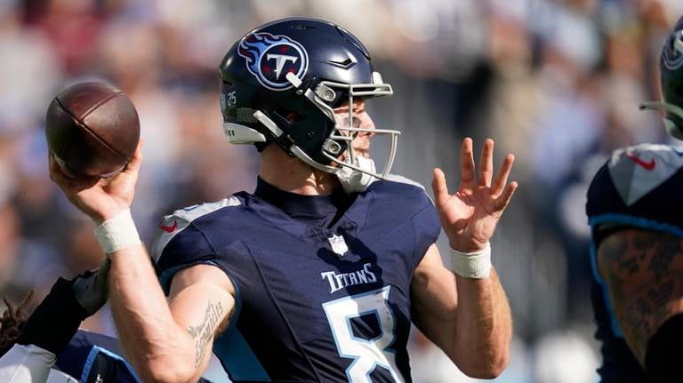 Tennessee Titans quarterback Will Levis throws during the first half...