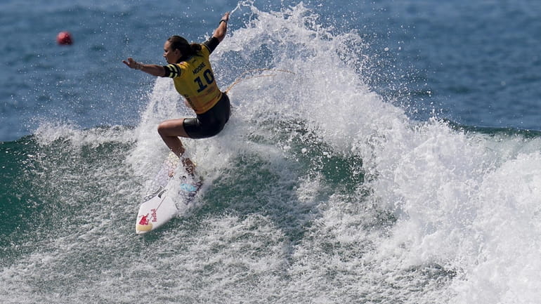 Carissa Moore, of the United States, practices for the WSL...