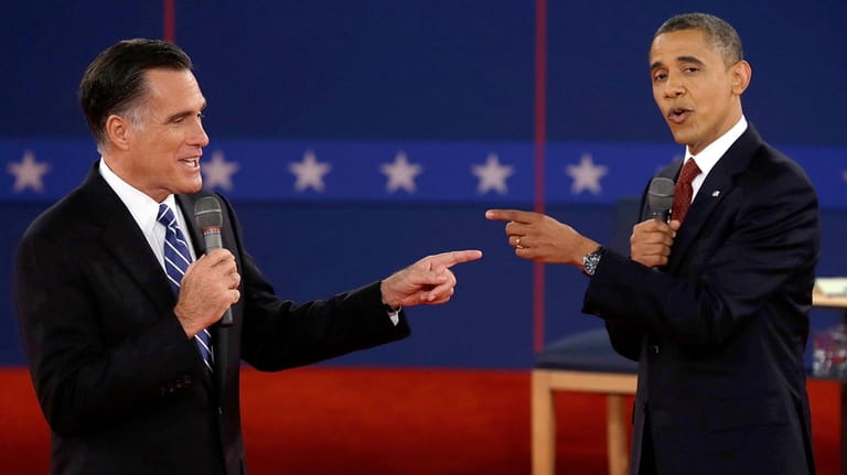 Republican presidential nominee Mitt Romney, left, and President Barack Obama...