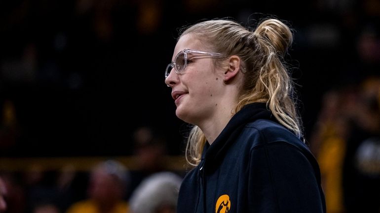 Iowa Hawkeyes forward Ava Jones (35) looks on during an...