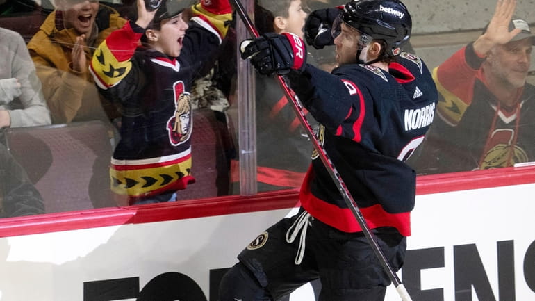 Ottawa Senators center Josh Norris celebrates his second goal of...