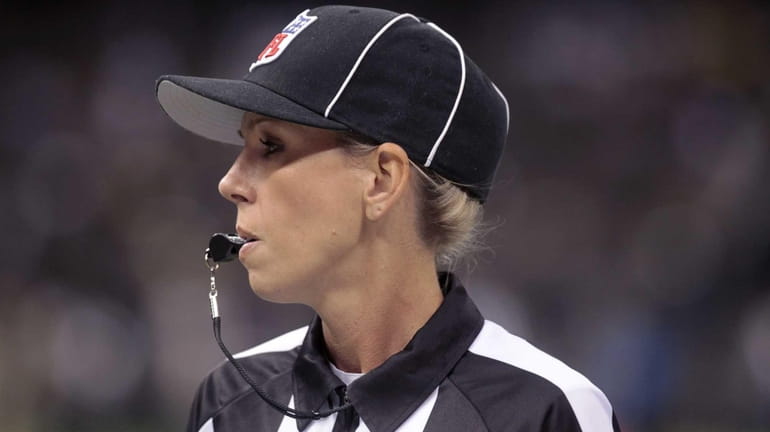 NFL referee Sarah Thomas is shown before a preseason game...